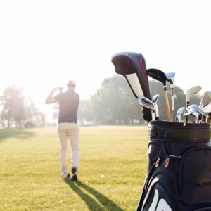 Back view of a male golfer swinging golf club in Blaine, Washington