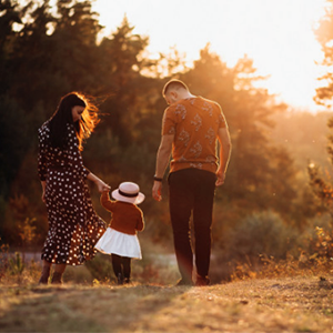 family taking a walk by Blaine's sunset