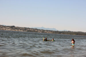 children swimming in Blaine, WA at Semiahmoo Spit