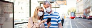 Vacationers Traveling with Masks