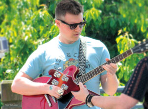 Alex Britton performs live music at Semiahmoo Resort's Summer BBQ Series starting May 24, 2025 at the resort in Blaine by the Sea!